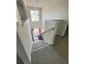 Bright and airy staircase leading to the upper level at 6921 Foxmoor Way, Douglasville, GA 30134