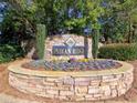 Stone entrance sign for Indian Ridge community with landscaping at 1326 Nantahala Ne Trl, Marietta, GA 30062