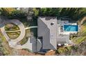 Aerial view of house, pool, and landscaped grounds at 1500 W Wesley Nw Rd, Atlanta, GA 30327