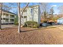 Side view of a two-story house with a yard at 283 Boulder Park Ln, Atlanta, GA 30331