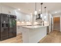 Modern kitchen with white cabinets, quartz countertops, and stainless steel appliances at 2911 Bentwood Dr, Marietta, GA 30062