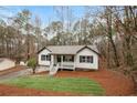 Newly renovated home with a large front yard at 170 Remington Ln, Acworth, GA 30101