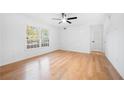 Bright bedroom with hardwood floors and white walls at 42 Cantey Nw Pl, Atlanta, GA 30327