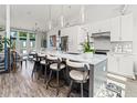 Modern kitchen with large island, stainless steel appliances, and white cabinetry at 462 Latta Ne St, Atlanta, GA 30308