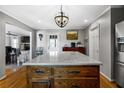 Kitchen island featuring a countertop and wooden cabinets at 4286 Pool Rd, Winston, GA 30187