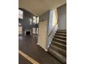 Two-story foyer with hardwood floors and staircase at 700 Somerset Vale Dr, Lawrenceville, GA 30044