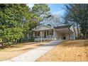 Charming ranch home with updated exterior and landscaped yard at 2198 Star Mist Sw Dr, Atlanta, GA 30311