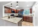 Modern kitchen with stainless steel appliances, granite countertops, and ample cabinet space at 2240 Cheshire Bridge Rd # 205, Atlanta, GA 30324