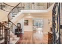 Grand entryway with a curved staircase and hardwood floors at 4340 Garmon Nw Rd, Atlanta, GA 30327