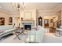 Elegant living room with a fireplace and hardwood floors at 4340 Garmon Nw Rd, Atlanta, GA 30327