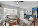 Open living space with comfy seating, large windows, and hardwood floors at 2127 Nichols Ln, Decatur, GA 30032