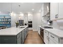 Bright kitchen with stainless appliances, ample counter space, and a stylish island at 290 Walker Ave, Alpharetta, GA 30076