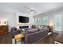 Spacious living room with large TV, modern fireplace, and comfortable seating at 290 Walker Ave, Alpharetta, GA 30076