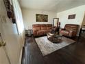 Bright living room with comfortable seating, accent rug and modern decor at 987 Forrest Se Cir, Atlanta, GA 30354