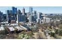 Aerial view showing the property's location in a cityscape with nearby park at 273 12Th Ne St # 114, Atlanta, GA 30309