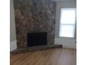 Stone fireplace in the living room at 701 Boone Ct, Stone Mountain, GA 30088