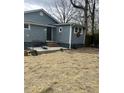 Spacious backyard with patio and grassy area at 25 Johnson Rd, Atlanta, GA 30318