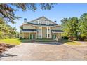 Two-story townhome with green doors and parking at 9404 Cypress Ln, Jonesboro, GA 30238