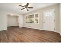 Bright living room featuring hardwood floors and a ceiling fan at 3860 Wisteria Sw Ln, Atlanta, GA 30331