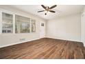 Spacious living room with hardwood floors and large windows at 3860 Wisteria Sw Ln, Atlanta, GA 30331