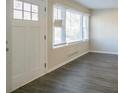 Bright living room featuring hardwood floors and lots of natural light at 2190 Greystone Way, Decatur, GA 30032