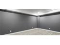 Nicely finished room with neutral carpet, painted walls, and white trim at 1320 Melbenan Dr, Atlanta, GA 30311