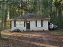 Cute cottage-style home with a covered porch at 2504 Stone Rd, Atlanta, GA 30344