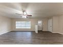 Bright living room with hardwood floors and ceiling fan at 2504 Stone Rd, Atlanta, GA 30344