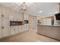 Spacious kitchen featuring granite countertops, stainless steel appliances, and ample cabinet space for storage at 4116 River Cliff Chase Se, Marietta, GA 30067