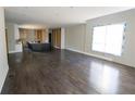 Open-concept living area with hardwood floors and ample natural light ready to make your own at 4238 Paces Ferry Se Rd, Atlanta, GA 30339