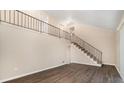 Open concept living area with loft and dark laminate floors at 3144 Granada, Atlanta, GA 30344