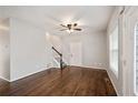 Spacious living room featuring hardwood floors and staircase at 2162 Larchwood Sw Rd, Atlanta, GA 30310