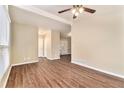 Hardwood floor living room with access to other rooms at 2280 Connally Ct, Atlanta, GA 30344