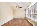Bright living room with hardwood floors and large windows at 2280 Connally Ct, Atlanta, GA 30344