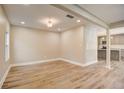 Open concept dining area with light walls and wood-look floors at 16 S Eugenia Nw Pl, Atlanta, GA 30318