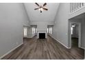 Spacious living room with vaulted ceiling, fireplace, and hardwood floors at 533 Halley Way, Stockbridge, GA 30281