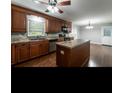 Island kitchen with stainless steel appliances at 1792 Hammond Woods Sw Cir, Marietta, GA 30008