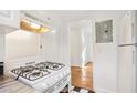 The kitchen is equipped with a four-burner stove and checkerboard floors at 320 3Rd Ne St # 1, Atlanta, GA 30308