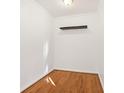 A small room with hardwood floors and a floating shelf at 320 3Rd Ne St # 1, Atlanta, GA 30308