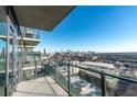 Bright living room with city views and modern furniture at 788 W Marietta Nw St # 1409, Atlanta, GA 30318