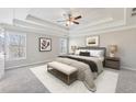 Large bedroom with high ceiling and neutral color palette at 5034 Hickory Hills Dr, Woodstock, GA 30188