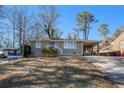 Ranch style home with carport and landscaped yard at 2159 Macon Sw Dr, Atlanta, GA 30315