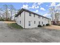Rear view of home showcasing the exterior and backyard at 1955 E Lake Dr, Marietta, GA 30066