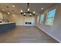 Spacious dining area with chandelier and fireplace at 3311 Cranston Ln, Kennesaw, GA 30144