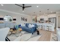 Open living space with blue sofa and modern decor at 3311 Cranston Ln, Kennesaw, GA 30144