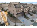 Townhome community view, showcasing homes and landscaping at 1072 Heyward Way, Alpharetta, GA 30009