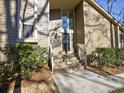 Front entrance with stairs and landscaping at 1550 Oak Creek Dr, Marietta, GA 30066