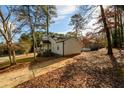 Side view of house showing driveway and backyard at 2107 Penrose Dr, Atlanta, GA 30344