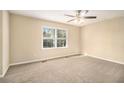 Spacious bedroom with neutral walls and carpet flooring at 2343 Maryland Ct, Decatur, GA 30032