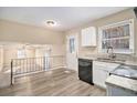 Modern kitchen with granite countertops and white cabinets at 2343 Maryland Ct, Decatur, GA 30032